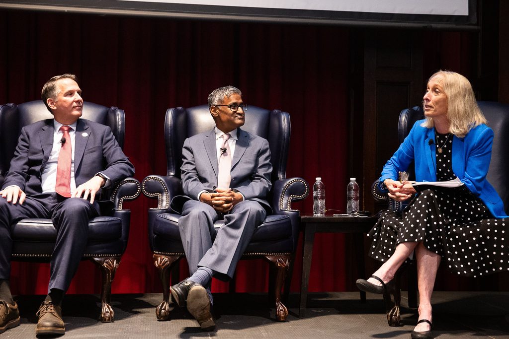 Congresswoman Mary Gay Scanlon speaks on the third panel of the day as other panelists listen.